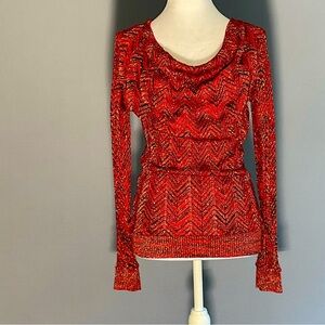 A little shimmer, a lot of confidence — the perfect statement sweater.